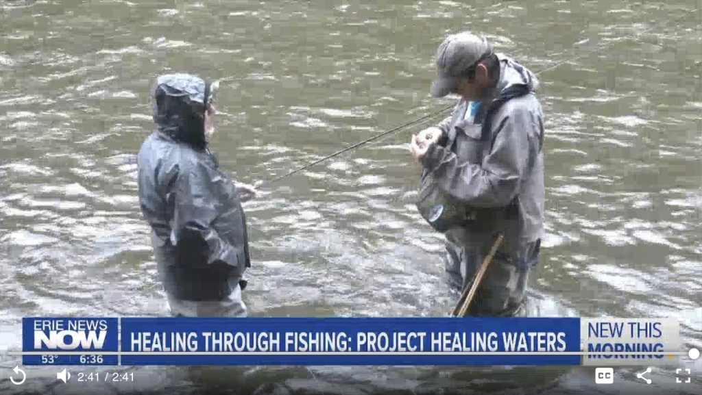 Two fly anglers making the most of a rainy day.
